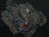 Пиролюзит игольчатые кристаллы в лимоните Урал