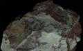 Киноварь с мелкокристаллические и порошкообразные скопления в мраморе Горный Алтай